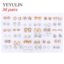 Load image into Gallery viewer, 36/18 Pair of Mixed Style Earrings
